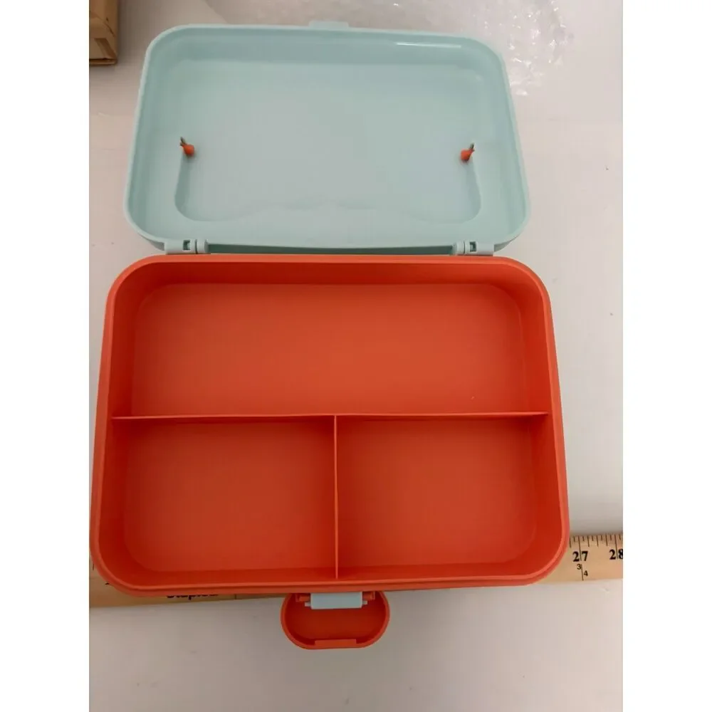 Modern portable plastic medicine box with orange handle and latch